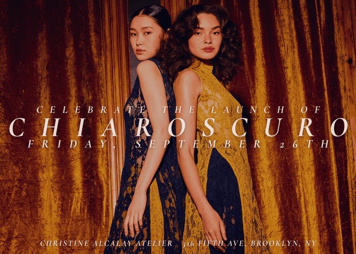 Two women wearing dresses 