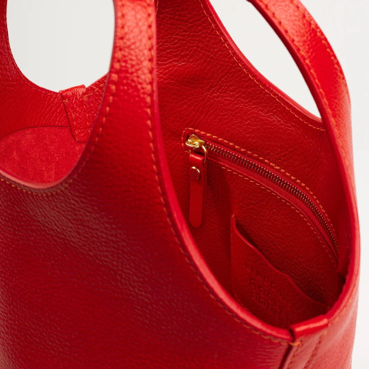 The Ama in Persimmon Bags Lindquist